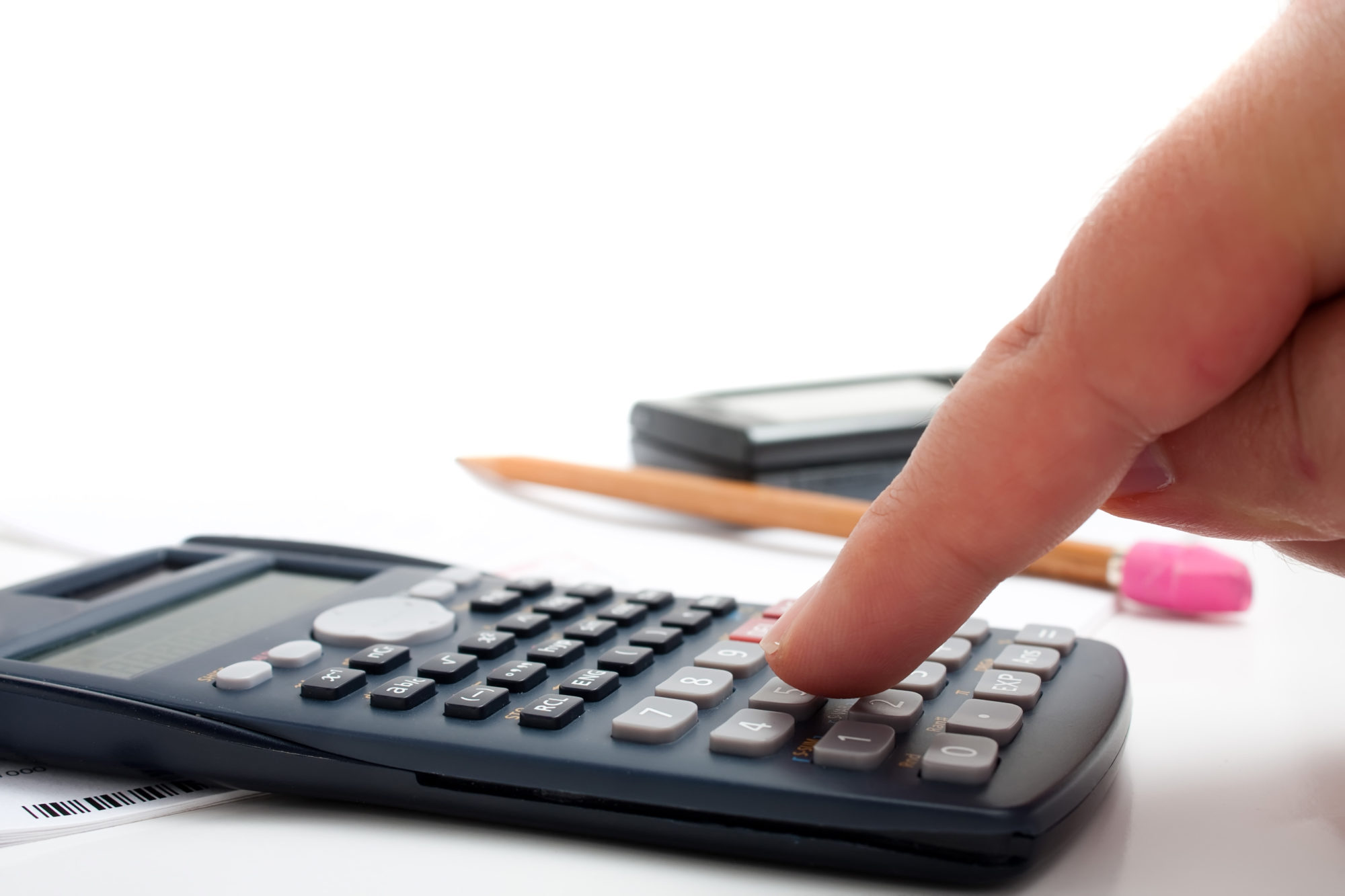 a finger adding up figures using a calculator isolated over a white background BKf vXDRrs